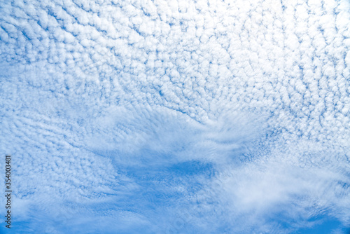 Clear blue sky with sun beam with cloudy