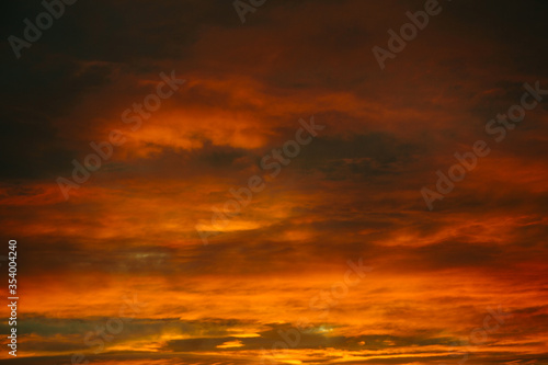 Dramatic sunset and sunrise sky. Sunset and sunrise orange and purple color sky background. Nature background © Alik Mulikov