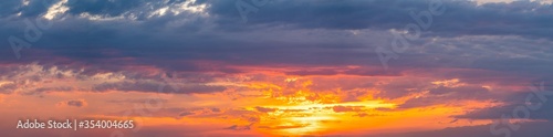 Beautiful sunset sky above clouds with dramatic light © background photo