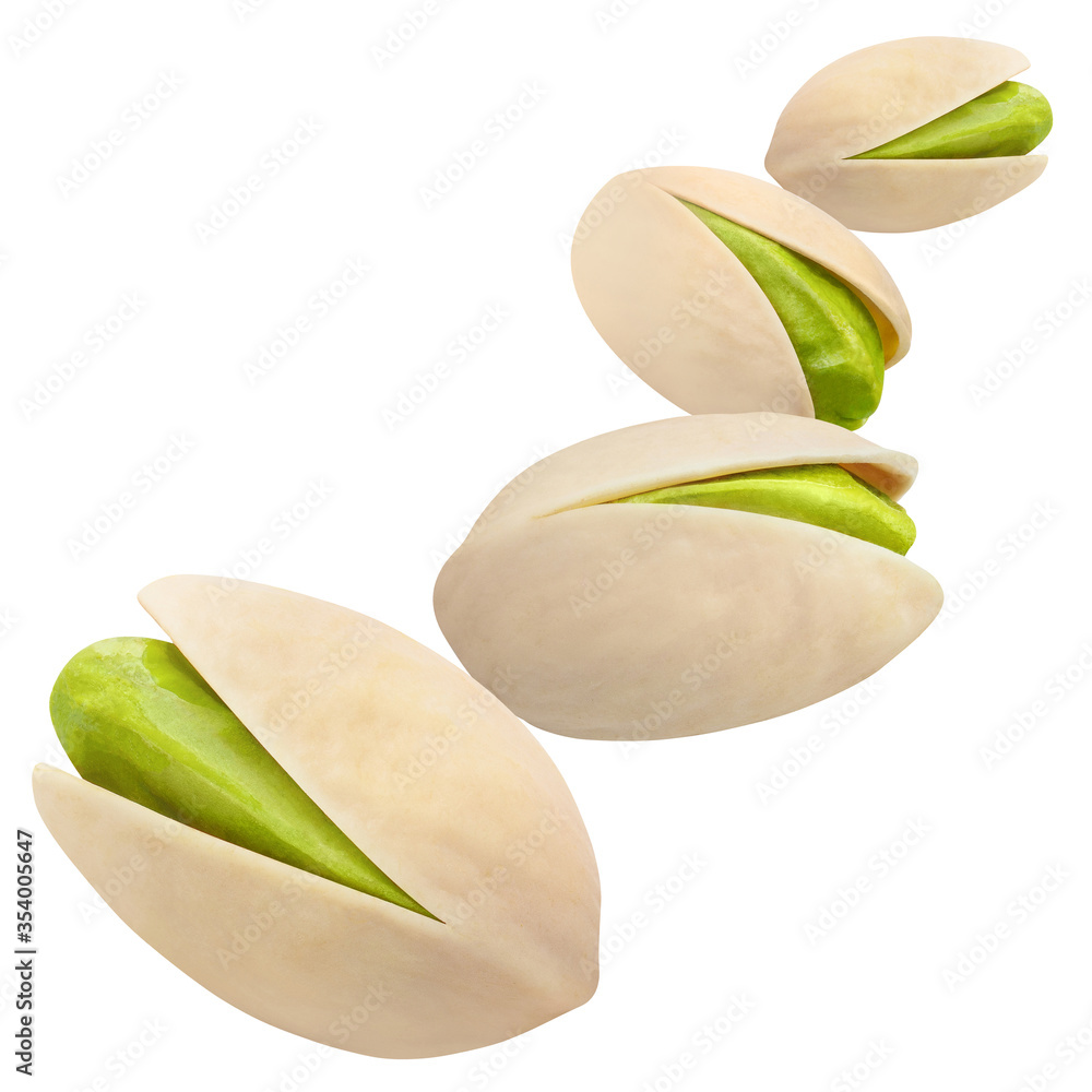 Flying pistachios, isolated on white background Flying pistachios, isolated on white background