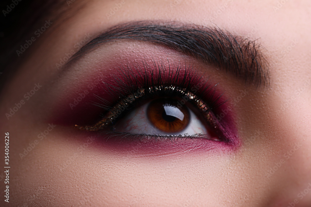 Fototapeta premium Close up, beautifully painted eye oriental style