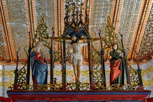 Jesus on the cross with holy figures