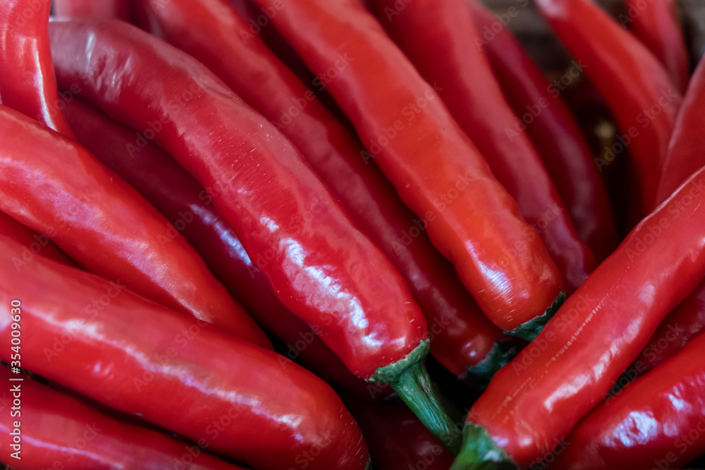 Red chili pepper background. Spices background closeup