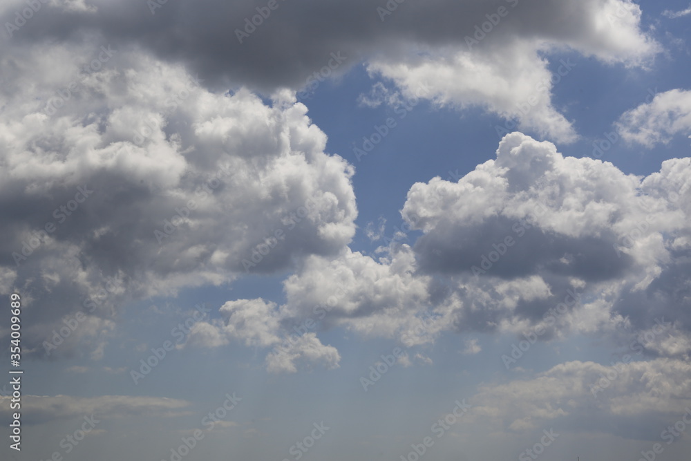 white fluffy clouds in the blue sky. white fluffy clouds in the blue sky.
