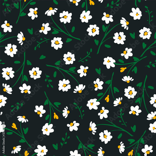 Abstract floral seamless pattern with chamomile. Trendy hand drawn textures.