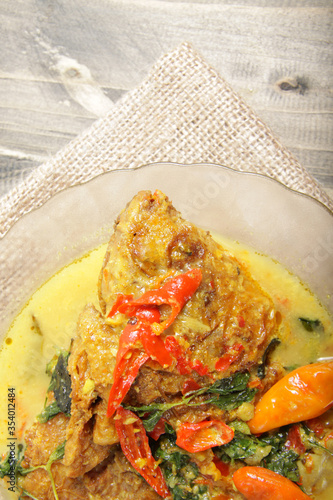 Mangut, an Indonesian food that made from fish as main inggredient, cook with some spices, chillies, and milk coconut photo