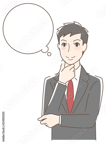 笑顔で想像する男性