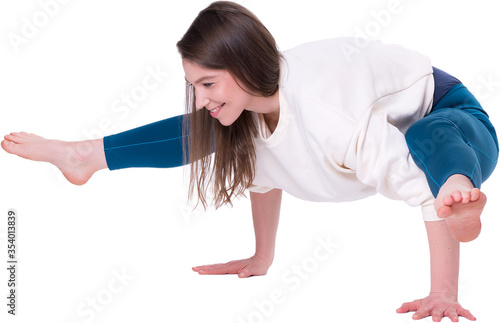 Young woman exercising (fitness, yoga, gymnastics) isoleted on white background