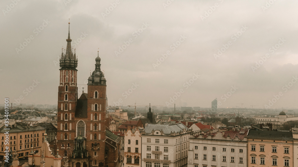 Skyline of the historic center of Krakow on a cloudy day. Poland panorama landscape. Space for text