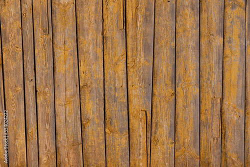 Obraz na płótnie Texture of a yellow fence made of wooden boards w salonie