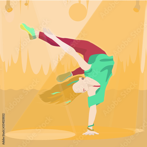 Girl dancing on stage a modern dance - break dance and happiness in dance