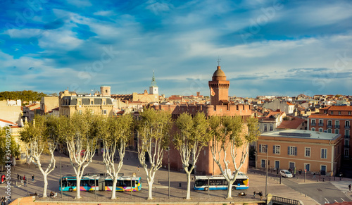 Aerial view to Le Castillet and the roofs of the old town within the Saint-Jean quarter in Perpignan, the capital of Catalonia, France