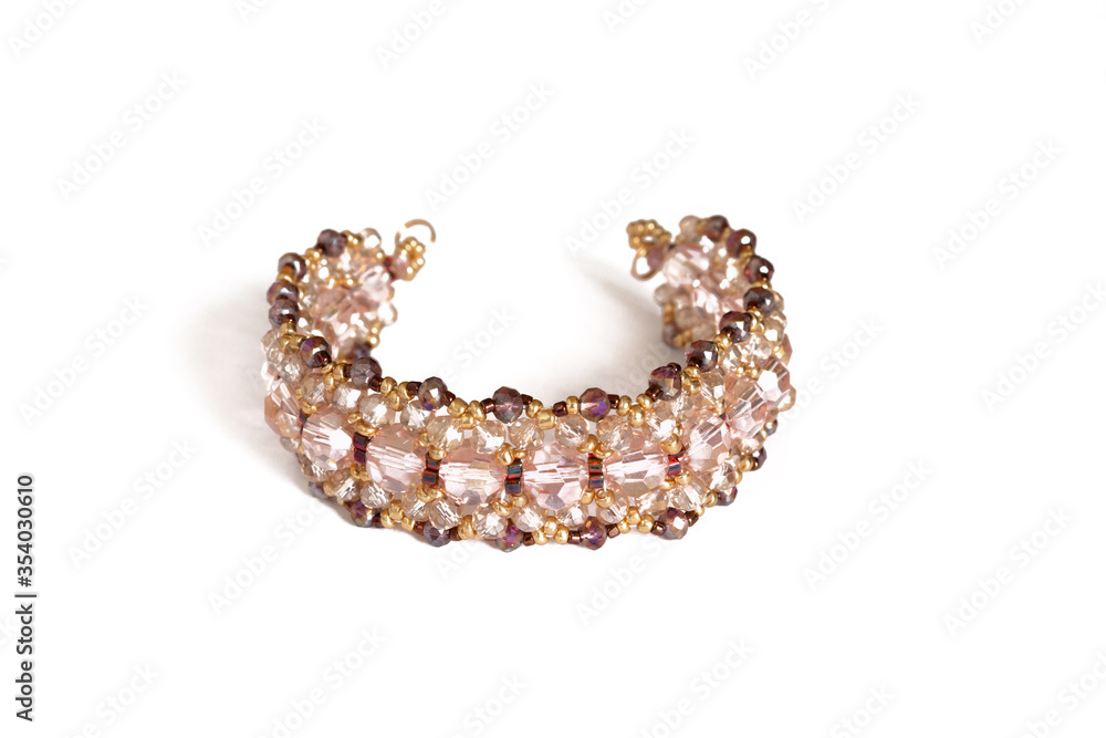 Hand made beaded bracelet on the background Hand made beaded bracelet on the background