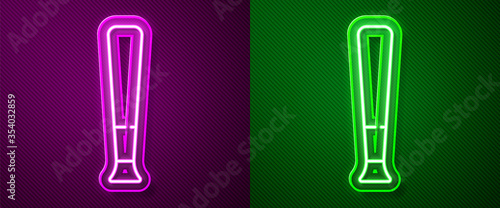 Glowing neon line Baseball bat icon isolated on purple and green background. Sport equipment. Vector Illustration.