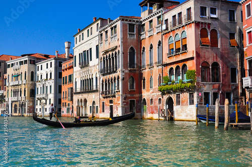 Canal with gondola in Venice Italy. © Olena_Fomina