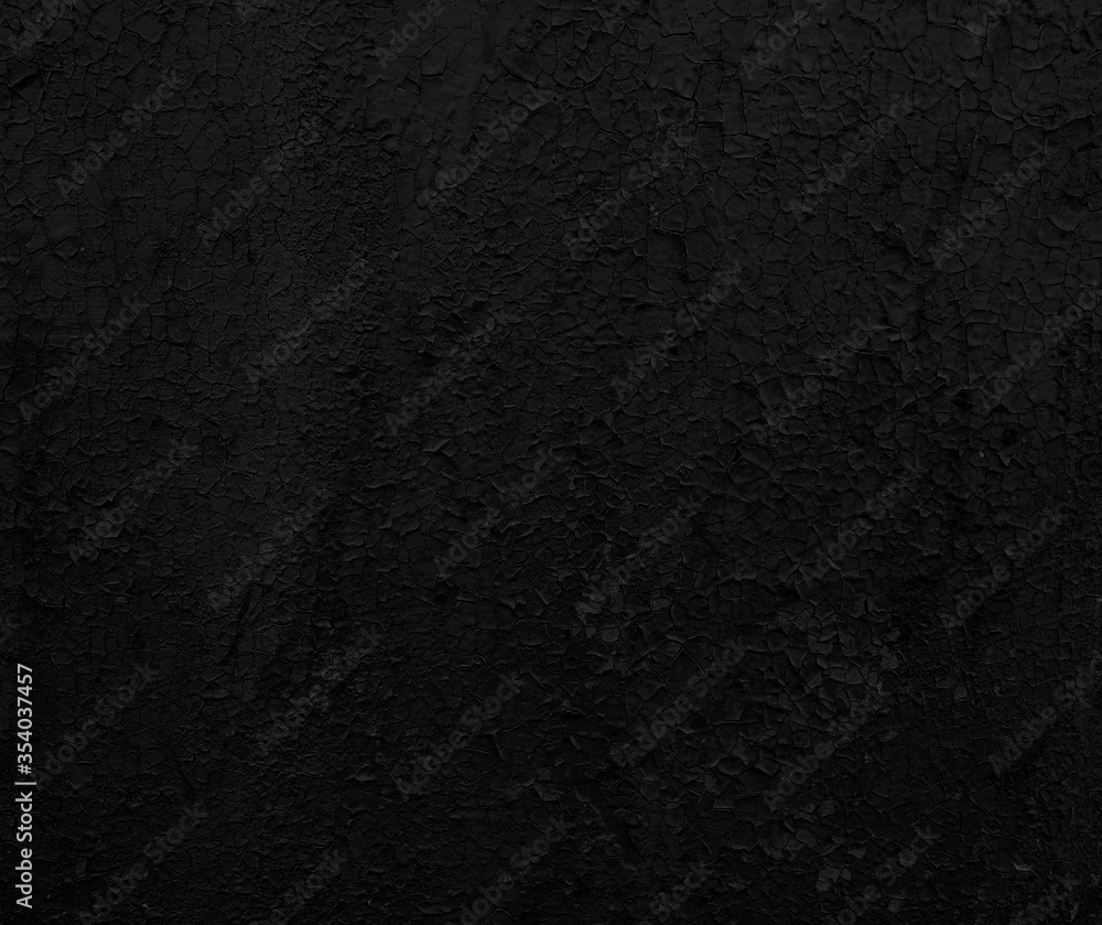 Obraz premium Black old surface with cracked paint. Grunge abstract texture background