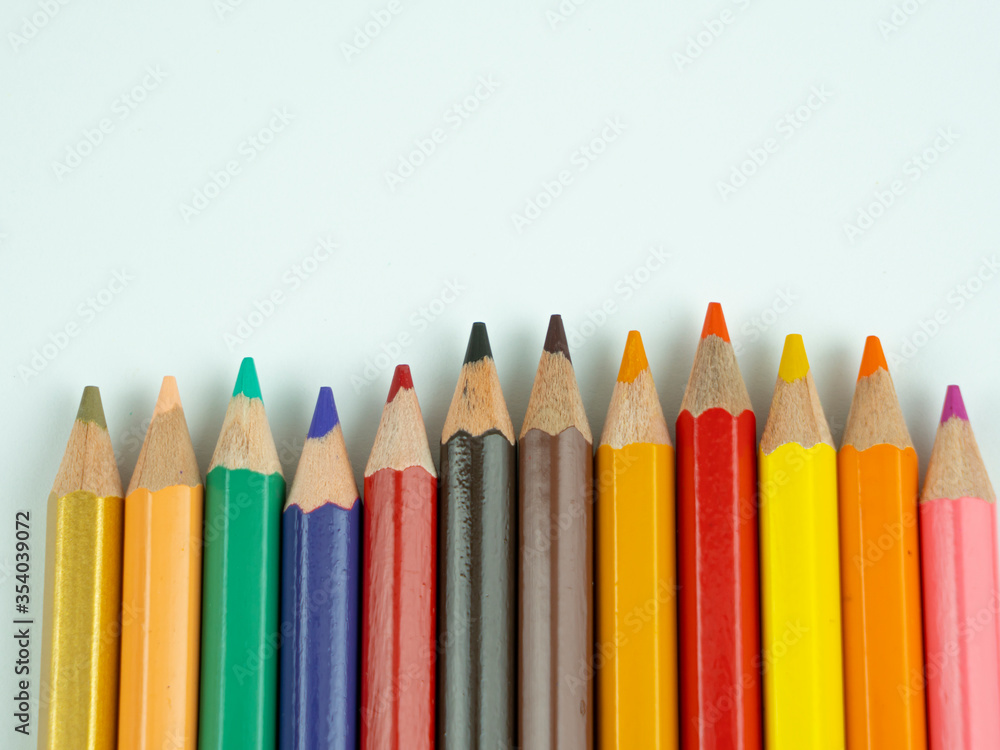 color pencils on a white background close-up color pencils on a white background close-up