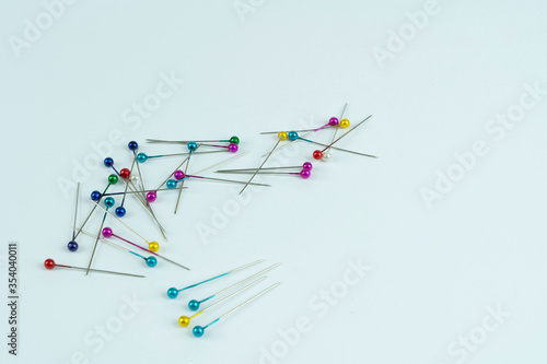 Colored pins isolated on white background 