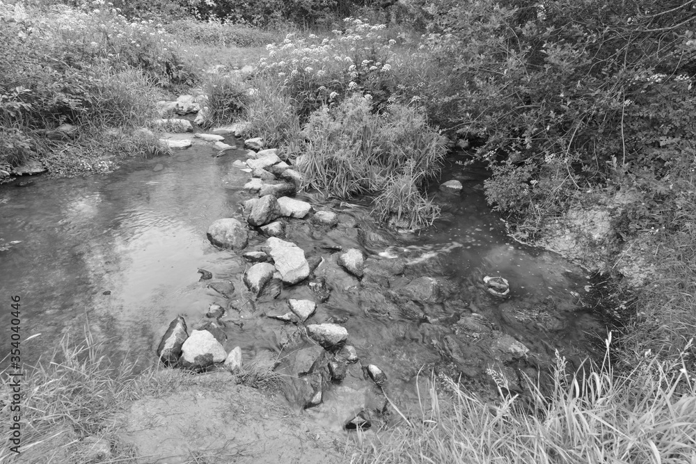 Stepping stones on the River Mole in Horley, Surrey. Stepping stones on the River Mole in Horley, Surrey.