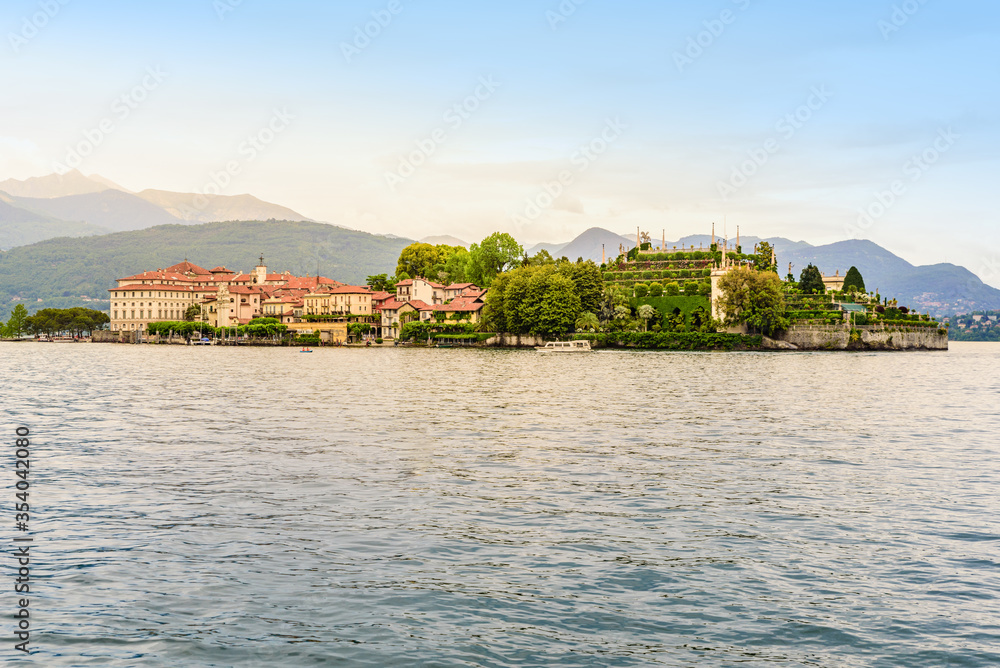 Isola Bella - fisherman island in Maggiore lake with mountains in the background, Borromean Islands (Isole Borromee), Stresa, Piedmont, Northern Italy - travel destination in Europe.