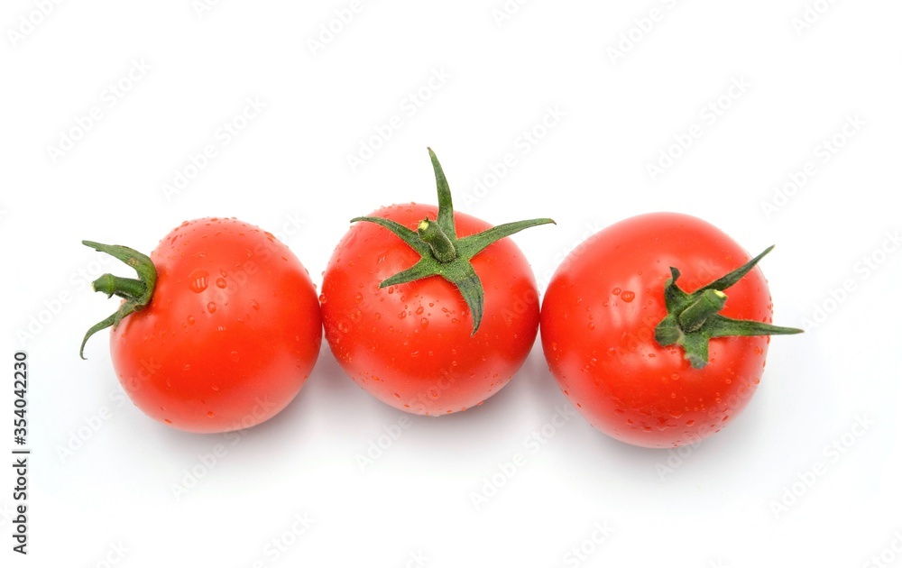 red tomatoes on white background red tomatoes on white background
