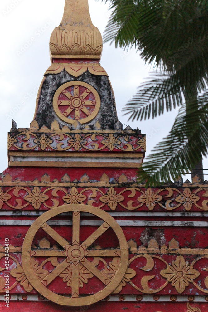 Architectural detail of a temple gateway installation in Siamese Lao PDR, Southeast Asia