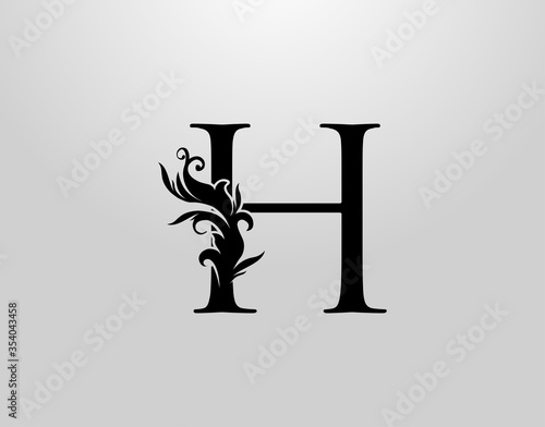 Letter H Swirl Logo. Classic H Letter Design Vector with Black Color and Floral Hand Drawn.