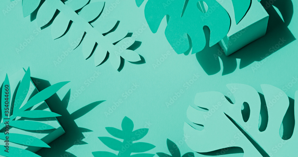 Toned photo of hand cut paper tropical plants leaves on the green background. Summer concept Top view
Toned photo of hand cut paper tropical plants leaves on the green background. Summer concept Top view