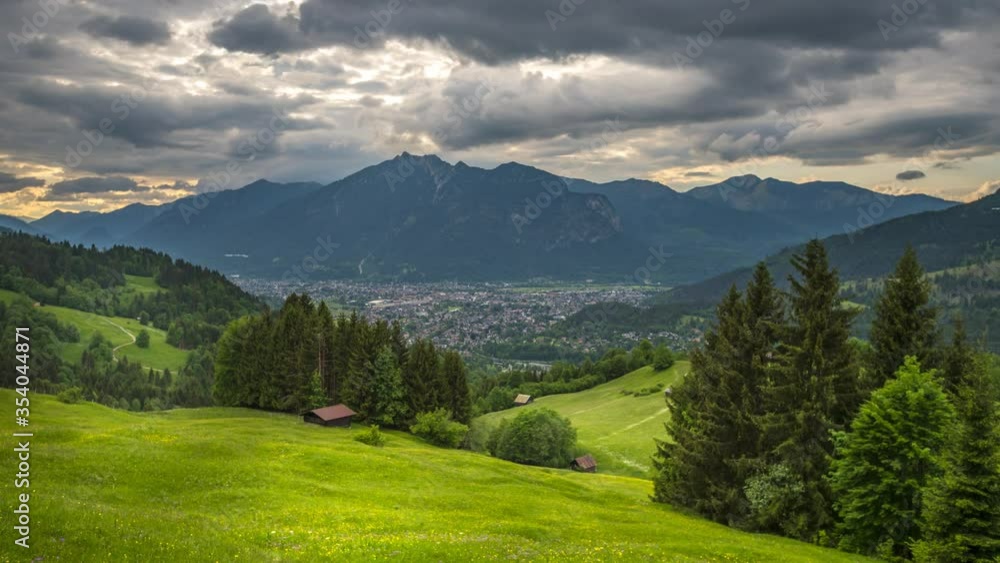 Garmisch partenkichen skyline aerial view of bavarian village nature landscapes alps mountains in backgorund time lapse video. Garmisch partenkichen skyline aerial view of bavarian village nature landscapes alps mountains in backgorund time lapse video.