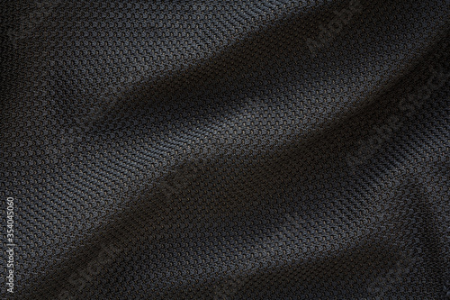 Fototapeta Naklejka Na Ścianę i Meble -  Detail of sportswear, texture of modern breathable fabric