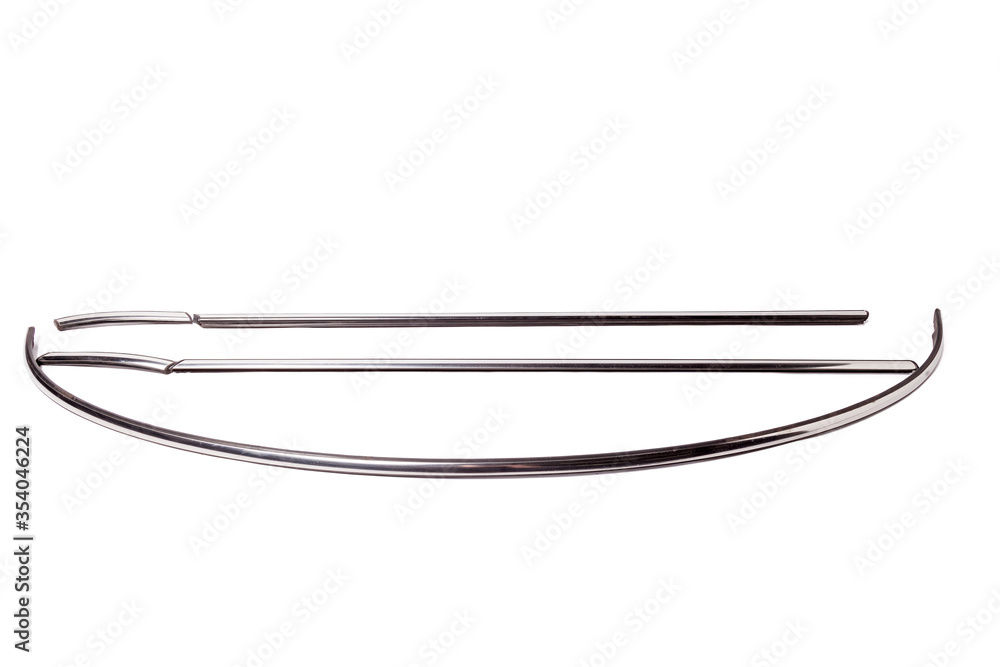 Silver plastic moldings for chrome glass in car windows - tuning element for sale in a car service on a white isolated background in a photo studio. Silver plastic moldings for chrome glass in car windows - tuning element for sale in a car service on a white isolated background in a photo studio.