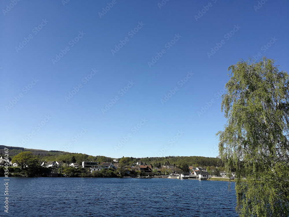 Fototapeta premium lake water and clear blue sky