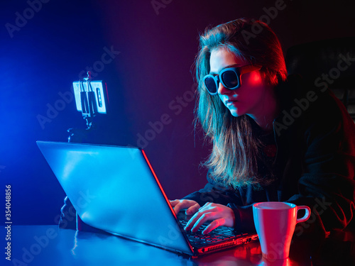 Woman web designer with lap...