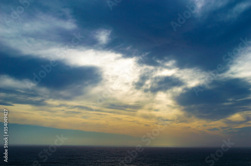 Genoa, Italy - CIRCA 2013: Dramatic clouds above Genoa Harbor. © HaniSantosa
