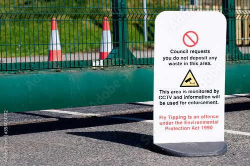 Canvas Print Fly tipping waste is monitored by council CCTV and an offence sign