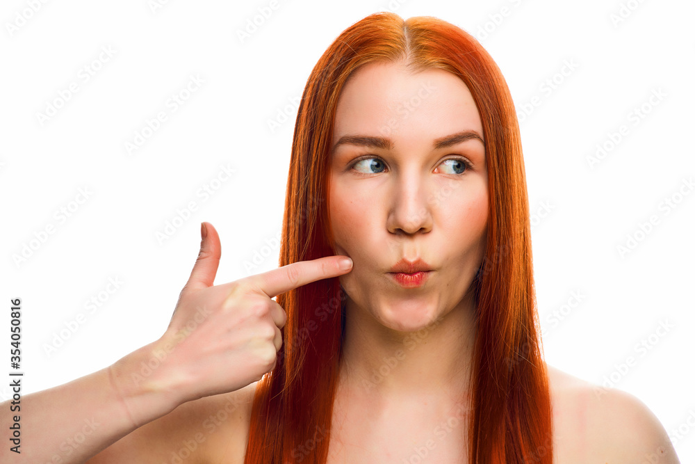 close beauty portrait of a red-haired girl with clean skin and various emotions. Isolated on a white background. close beauty portrait of a red-haired girl with clean skin and various emotions. Isolated on a white background.