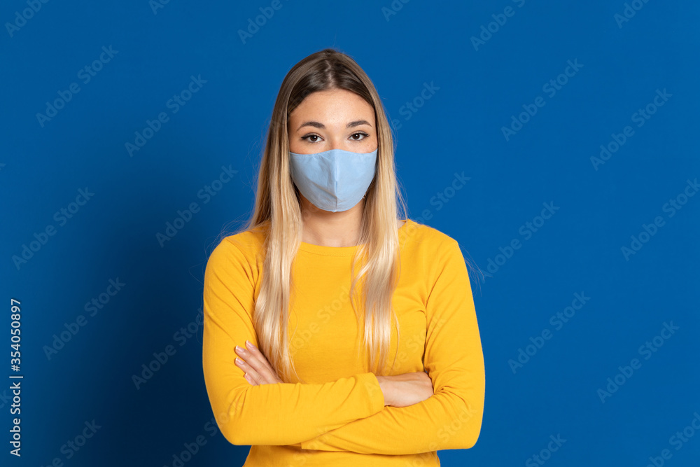 Blonde girl wearing a face mask Blonde girl wearing a face mask