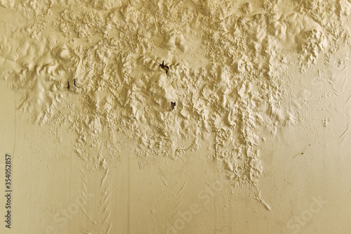Wall cracked color by moisture humidity, Peeled wall from rain leakage, Wall color dampness damage is common house problem. photo