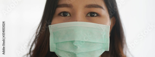 Crop face of mask wearing protection for corona virus, covid-19.