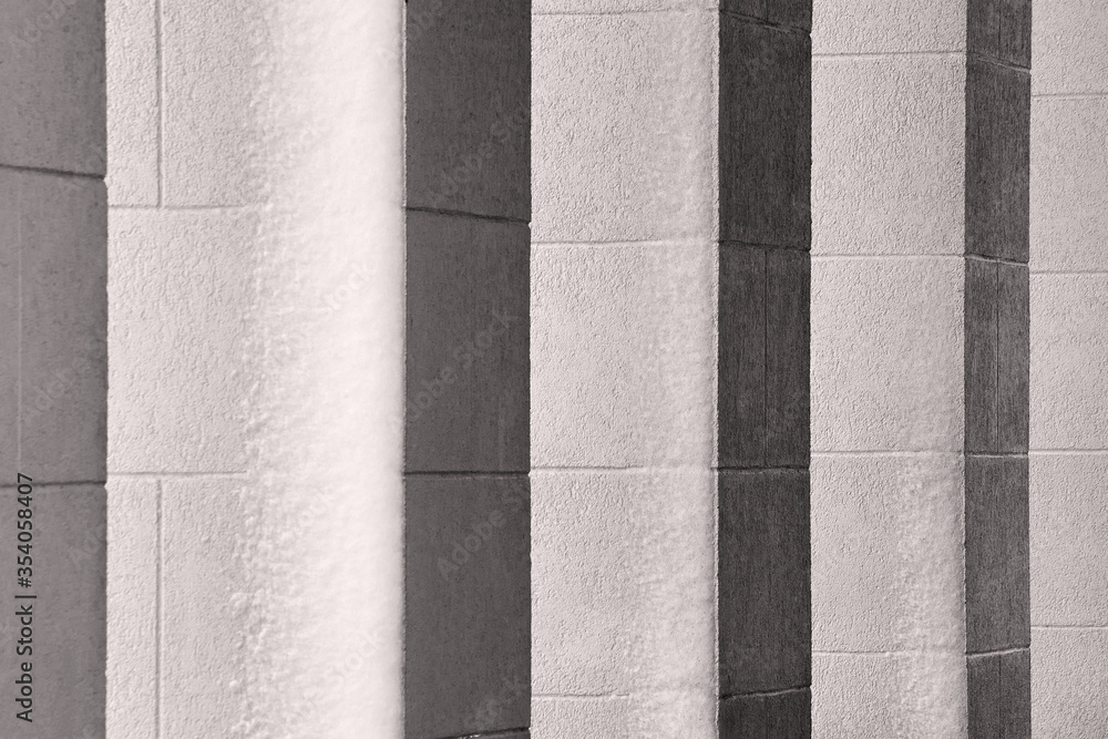 row of square columns of gray