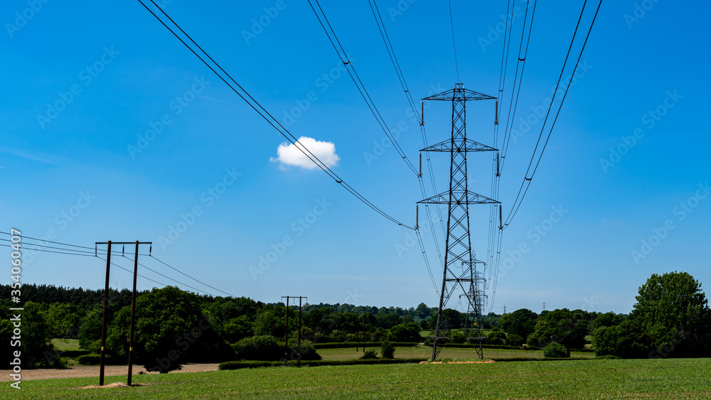 High voltage power lines in the field 