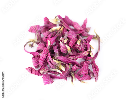 Dried Echinacea flowers, isolated on white background. Petals of Echinacea purpurea. Medicinal herbs. Top view.