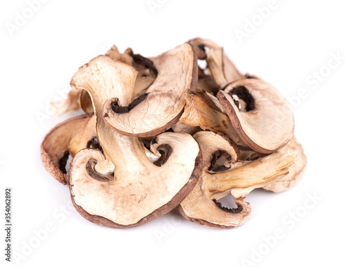 Dried sliced mushrooms isolated on white background. Dry champignons.