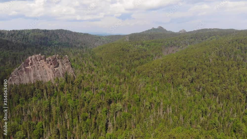 Aerial view of rocks in the Siberian forest. Aerial view of rocks in the Siberian forest.