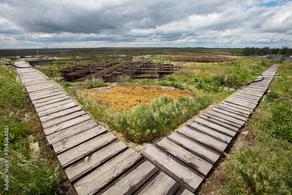 Background old sewage treatment plant. Background old sewage treatment plant.