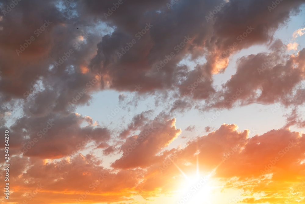 Fototapeta premium Beautiful bright sunset sky. Dramatic colorful clouds after sunset. Nature backgrounds.Beautiful bright sunset sky. Dramatic colorful clouds after sunset. Nature backgrounds.