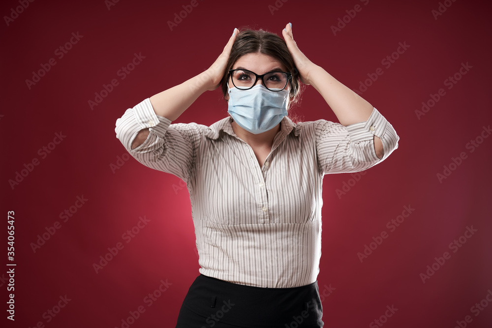 Stressed businesswoman holding her head Stressed businesswoman holding her head
