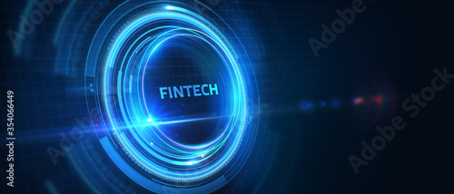 Fintech -financial technology concept.Young businessman select the icon Fintech on the virtual display. 3D illustration.