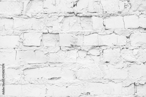 White brick wall close-up. Rough background.