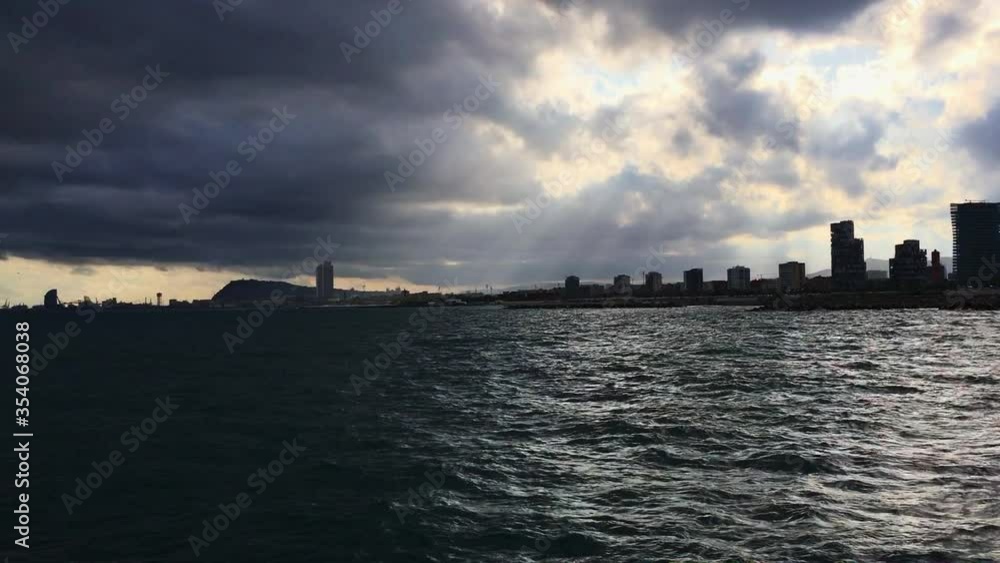 storm in barcelona from the mediterranean, skyline storm in barcelona from the mediterranean, skyline